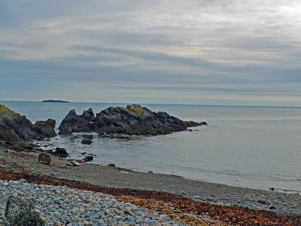 Map 4-lot Map 4-lot Main Rd Isle Stonington, ME 04681 - Photo 3 of 17 Crescent sand and rock beach.