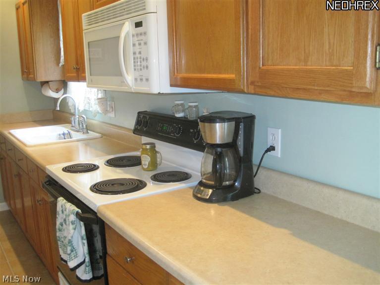 4196 Beat Road Litchfield, OH 44253 - Photo 4 of 22 Laminate counters with new flooring.
