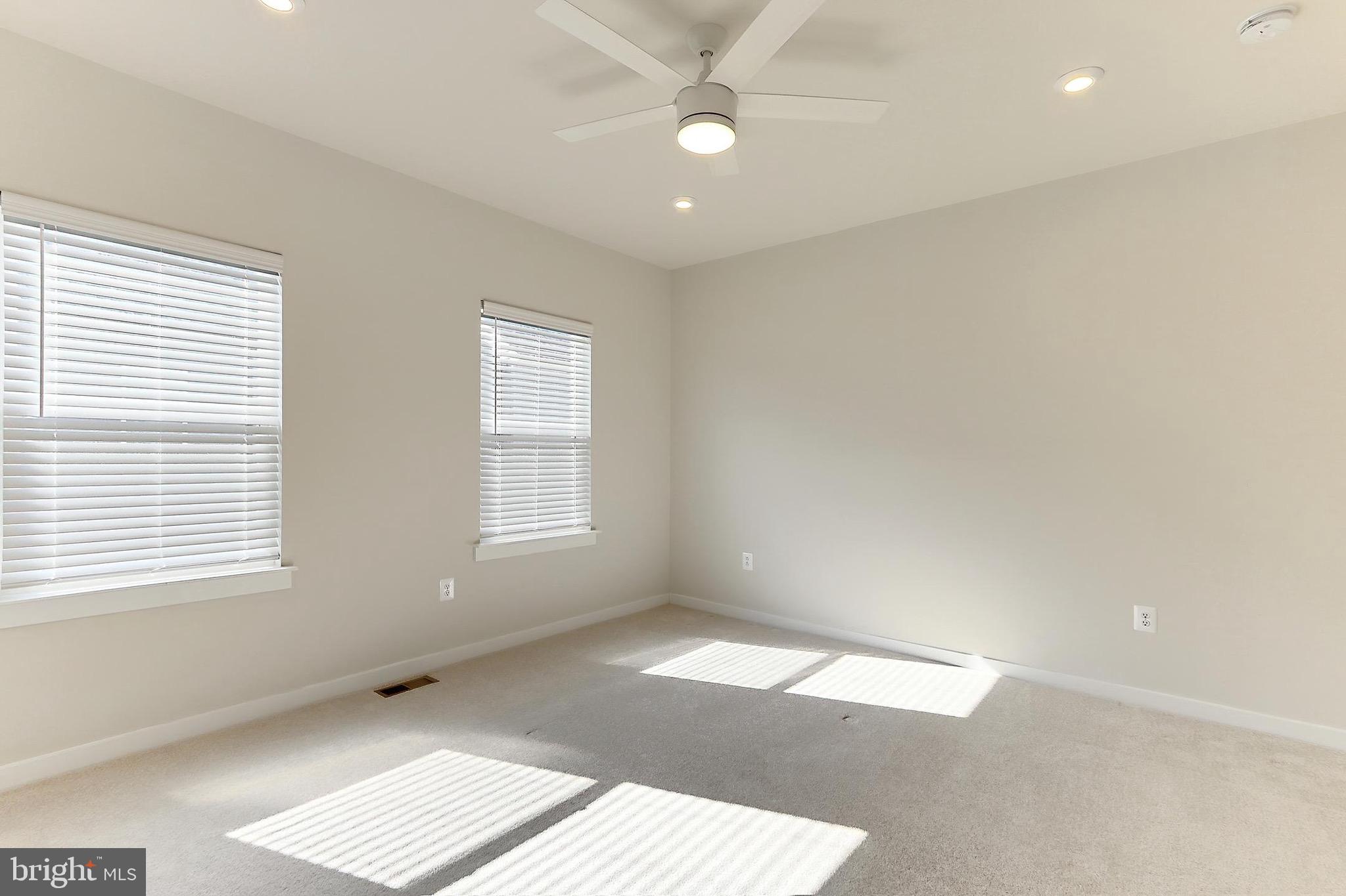 14176 Gypsum Loop Chantilly, VA 20151 - Photo 32 of 44 a view of an empty room with a window
