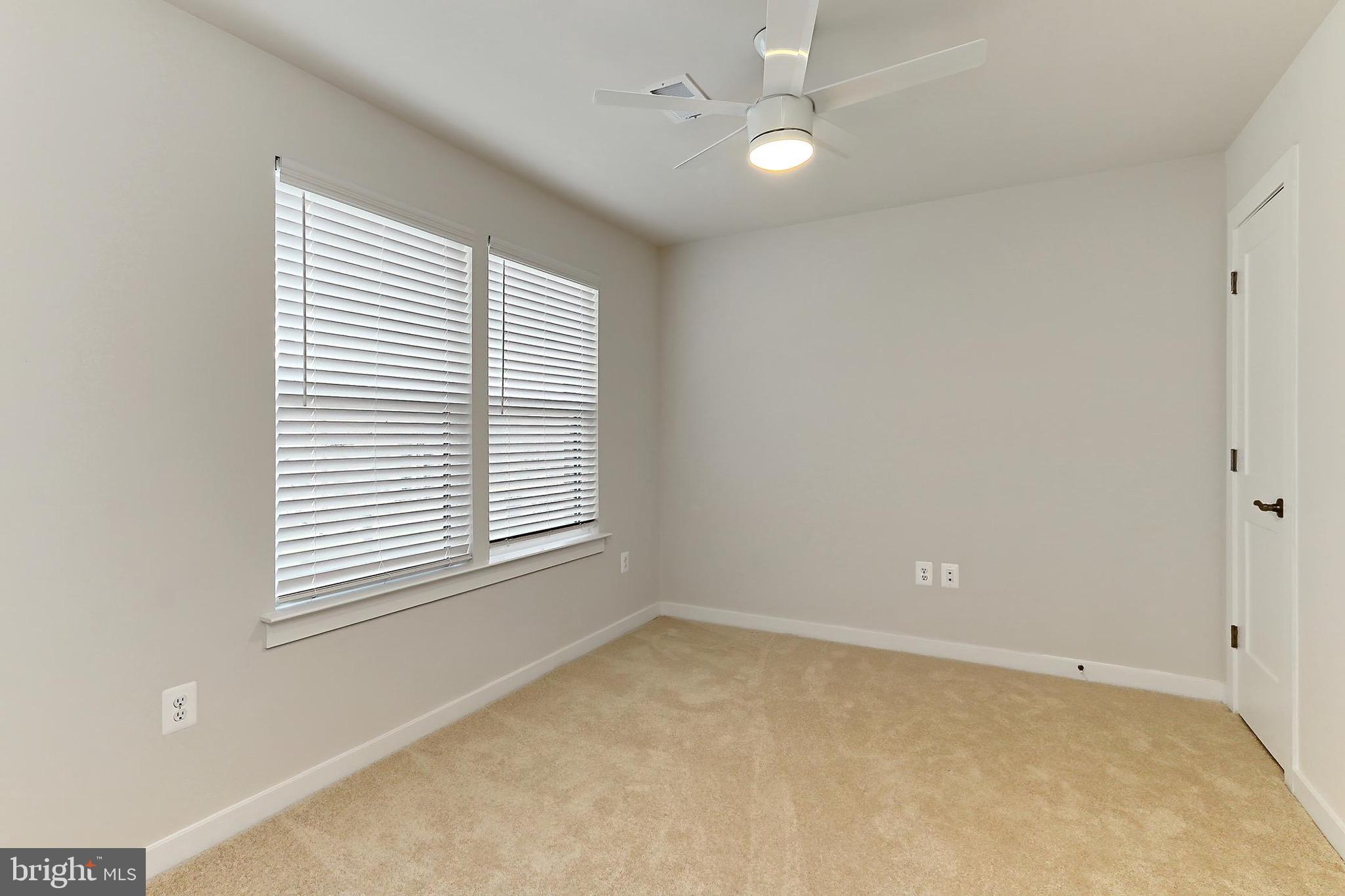 14176 Gypsum Loop Chantilly, VA 20151 - Photo 37 of 44 a view of an empty room with a window