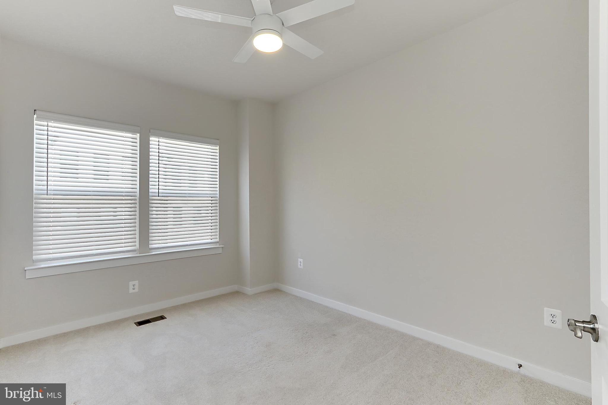 14176 Gypsum Loop Chantilly, VA 20151 - Photo 41 of 44 an empty room with a window