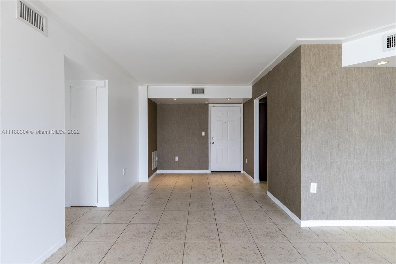 1621 Bay Road, Unit 602 Miami Beach, FL 33139 - Photo 23 of 28 a view of a hallway