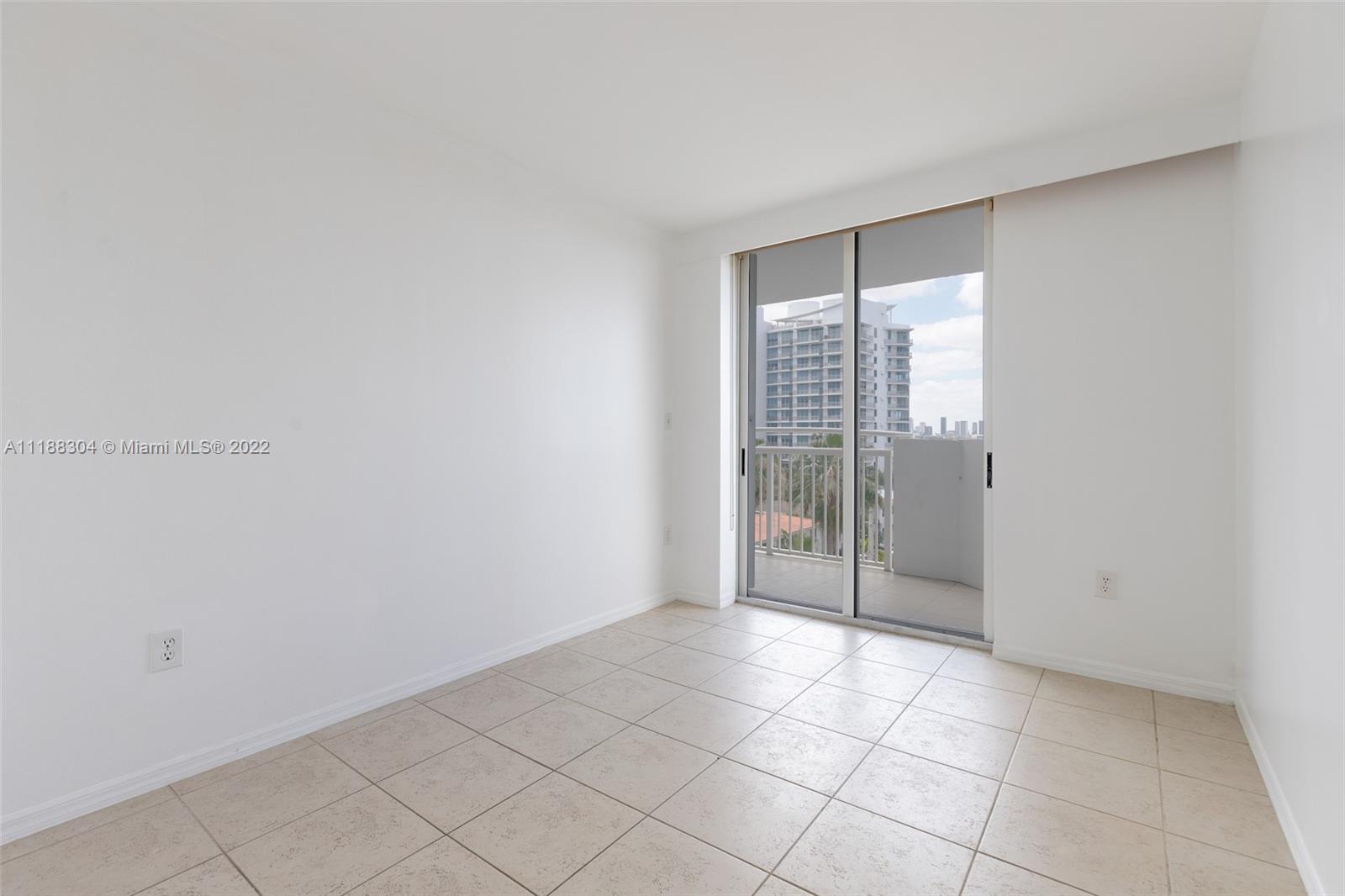 1621 Bay Road, Unit 602 Miami Beach, FL 33139 - Photo 25 of 28 a view of an empty room with window