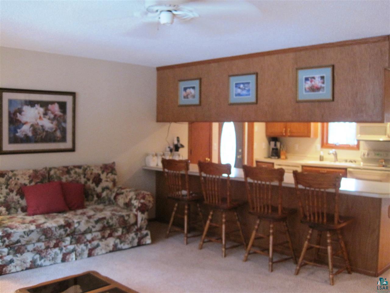 8125 East Tri Lakes Road Superior, WI 54880 - Photo 20 of 43 living into Kitchen