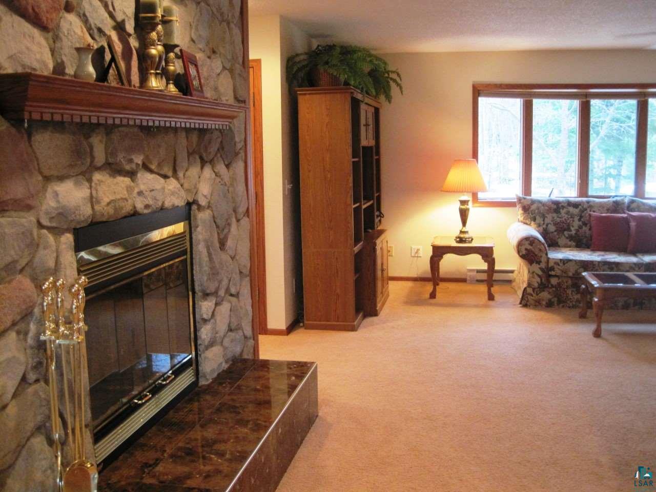 8125 East Tri Lakes Road Superior, WI 54880 - Photo 23 of 43 Wood Fireplace