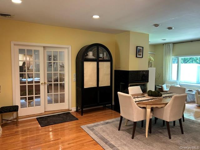 3 Fox Lane Locust Valley, NY 11560 - Photo 13 of 38 Decorative Glass Doors welcome you into the Dining Room