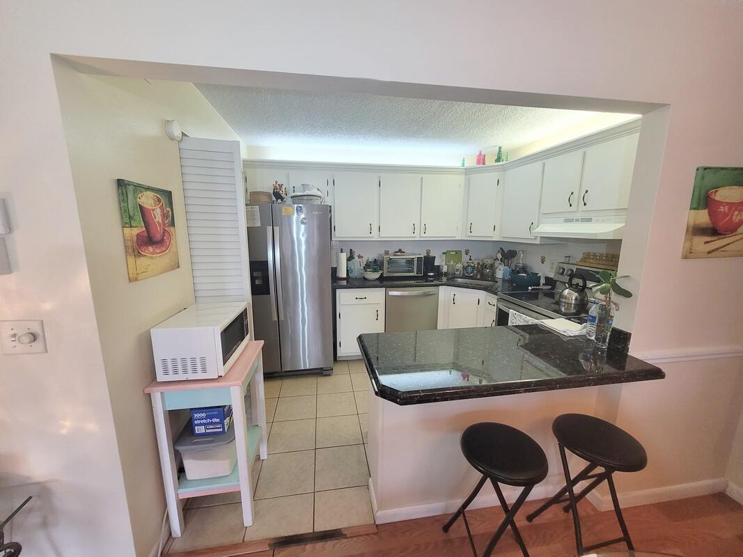 320 Pine Ridge Circle, Unit A1 Greenacres, FL 33463 - Photo 7 of 65 20220403_132527