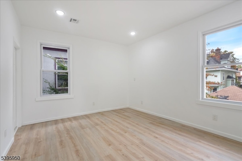 813 South 12th Street Newark, NJ 07108 - Photo 10 of 14 an empty room with a window