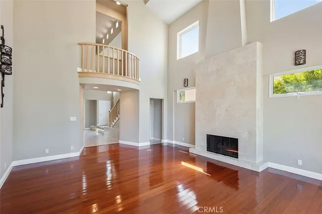 a view of a room with window and furniture