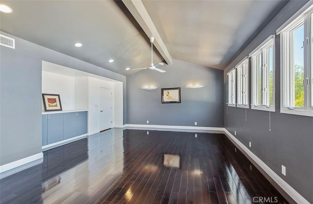 24907 Marbella Court Calabasas, CA 91302 - Photo 21 of 34 a view of empty room with wooden floor and fan