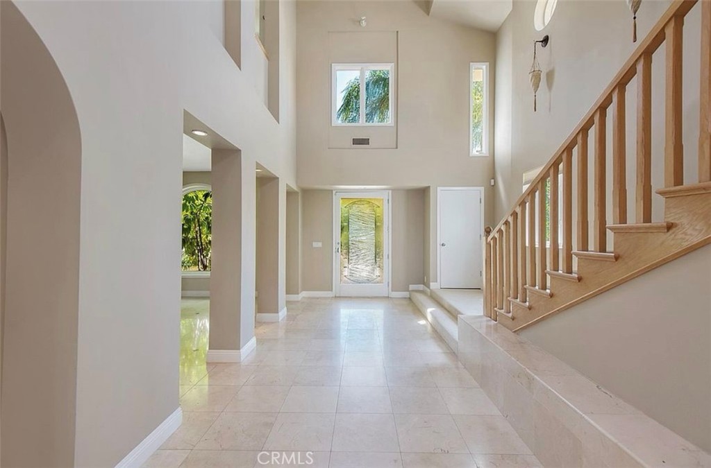 24907 Marbella Court Calabasas, CA 91302 - Photo 7 of 34 a view of an entryway with wooden floor