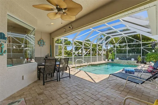 a view of house with backyard porch and furniture