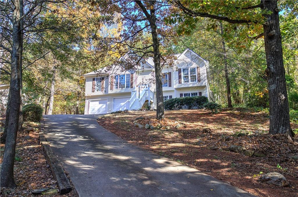 15 Roving Hills Circle Cartersville, GA 30121 - Photo 3 of 55 a view of a house with a yard