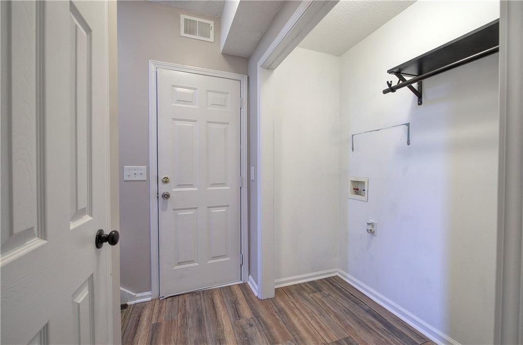 15 Roving Hills Circle Cartersville, GA 30121 - Photo 34 of 55 a view of a room with wooden floor