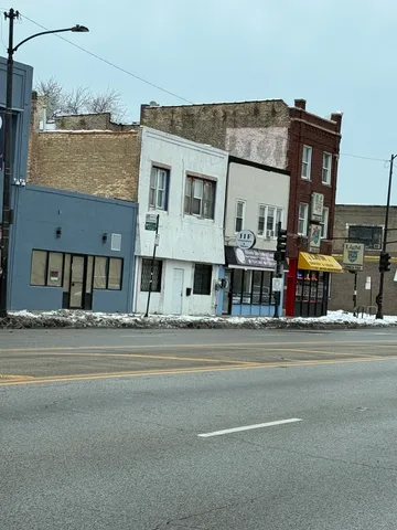 a view of a building and a street