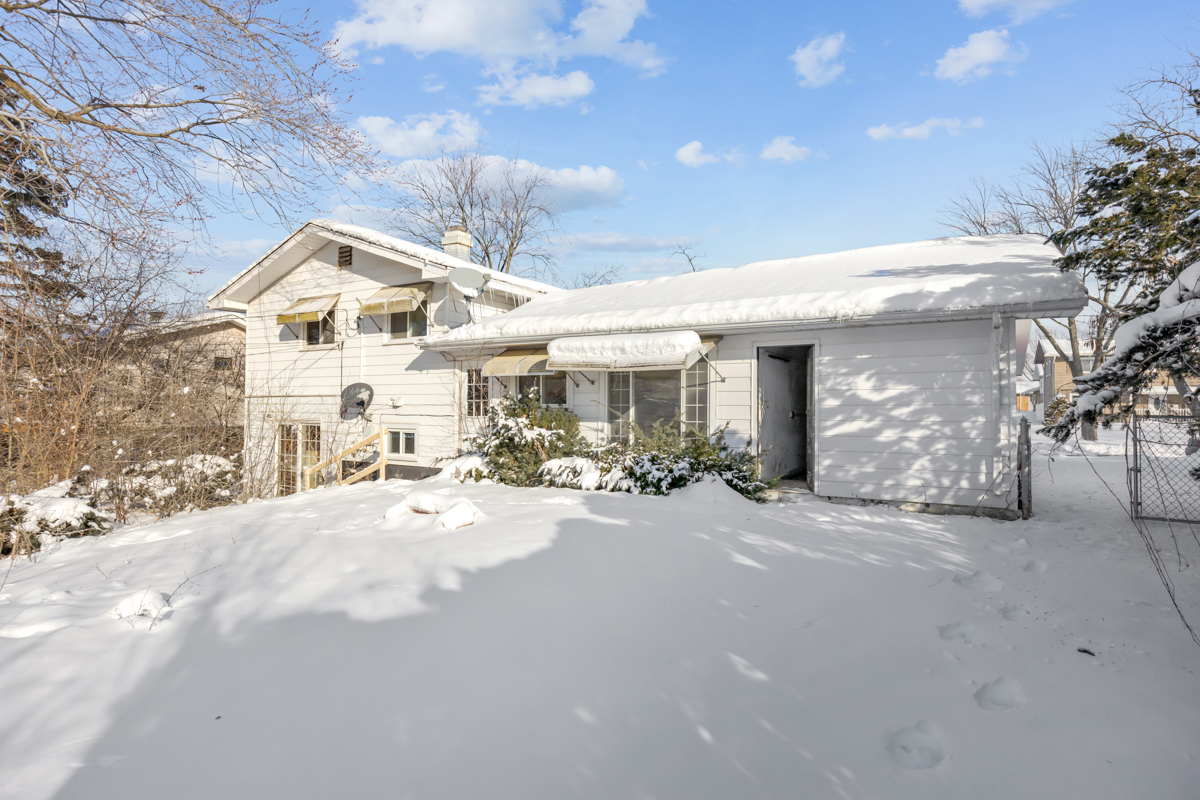 1950 Ashley Road Hoffman Estates, IL 60169 - Photo 18 of 19 a view of a house with outdoor space and a yard