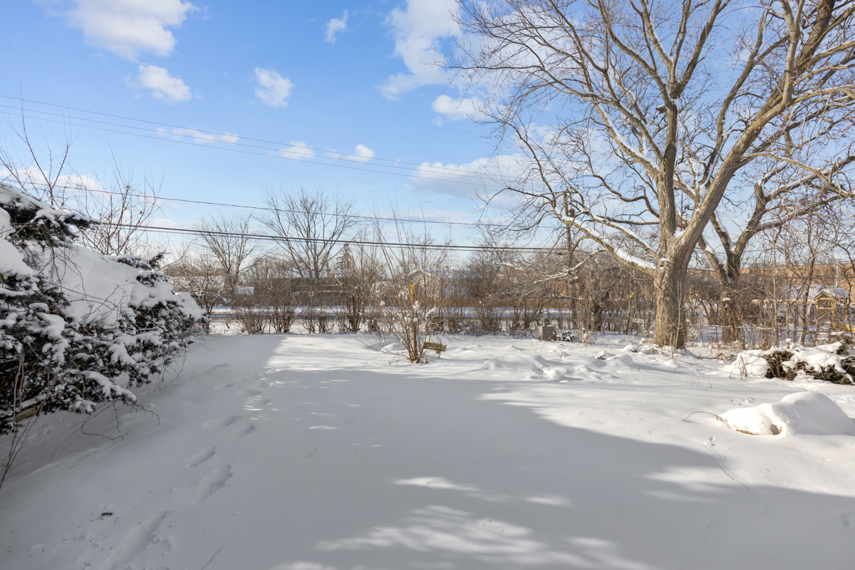 1950 Ashley Road Hoffman Estates, IL 60169 - Photo 19 of 19 a view of a road with snow on the road