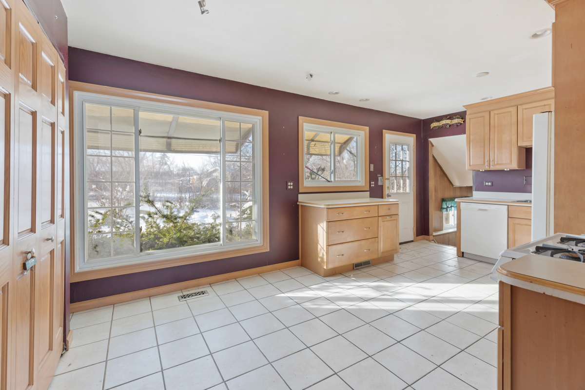 1950 Ashley Road Hoffman Estates, IL 60169 - Photo 4 of 19 a kitchen with a sink cabinets and appliances