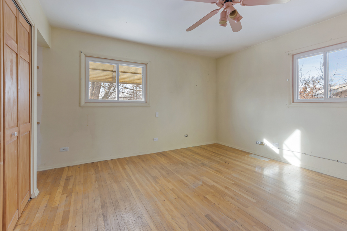 1950 Ashley Road Hoffman Estates, IL 60169 - Photo 8 of 19 a view of empty room with wooden floor