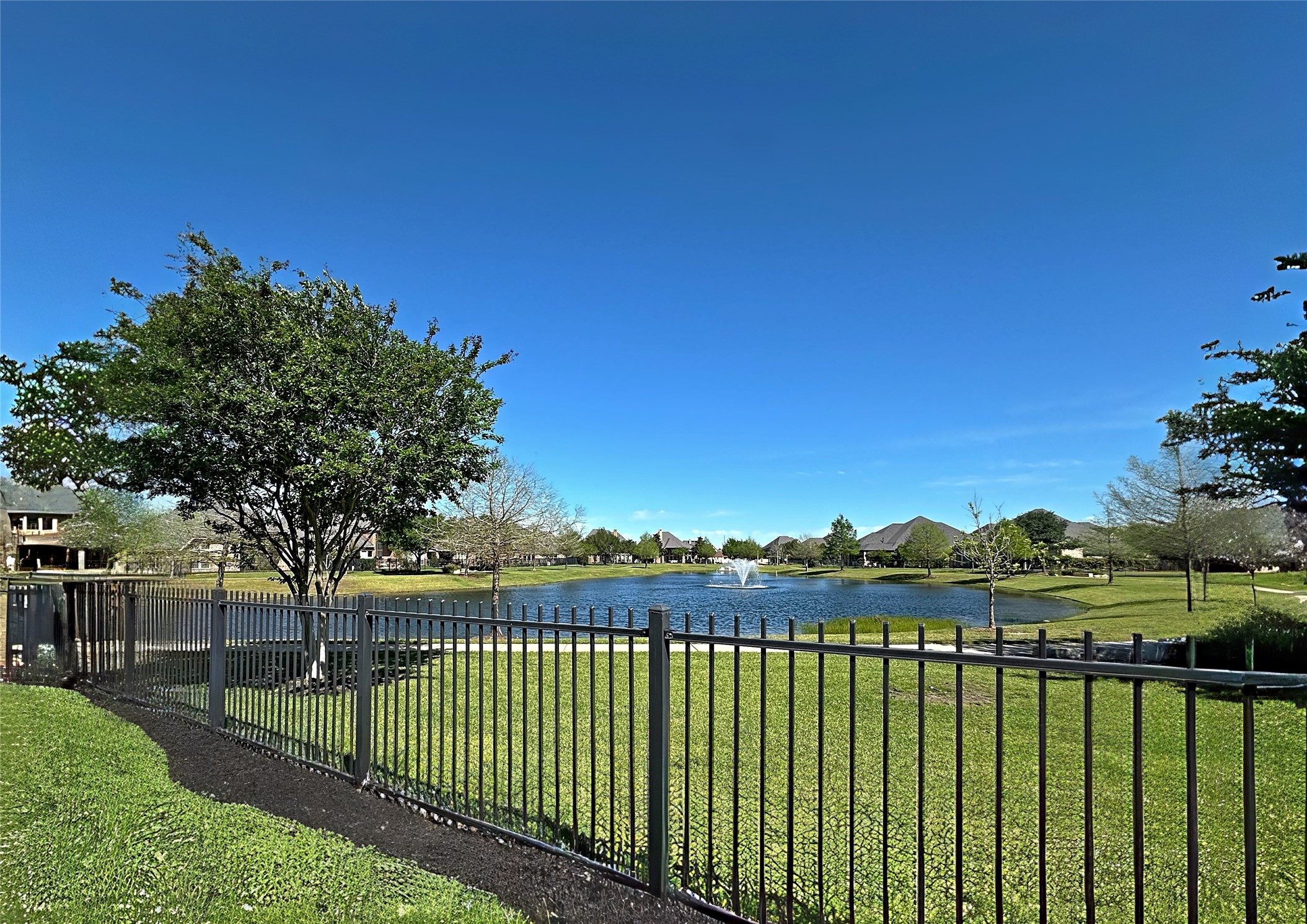 27838 Colonial Point Drive Katy, TX 77494 - Photo 3 of 28 Backs to water with peaceful lake views, a walking trail, and nearby school bus stop.