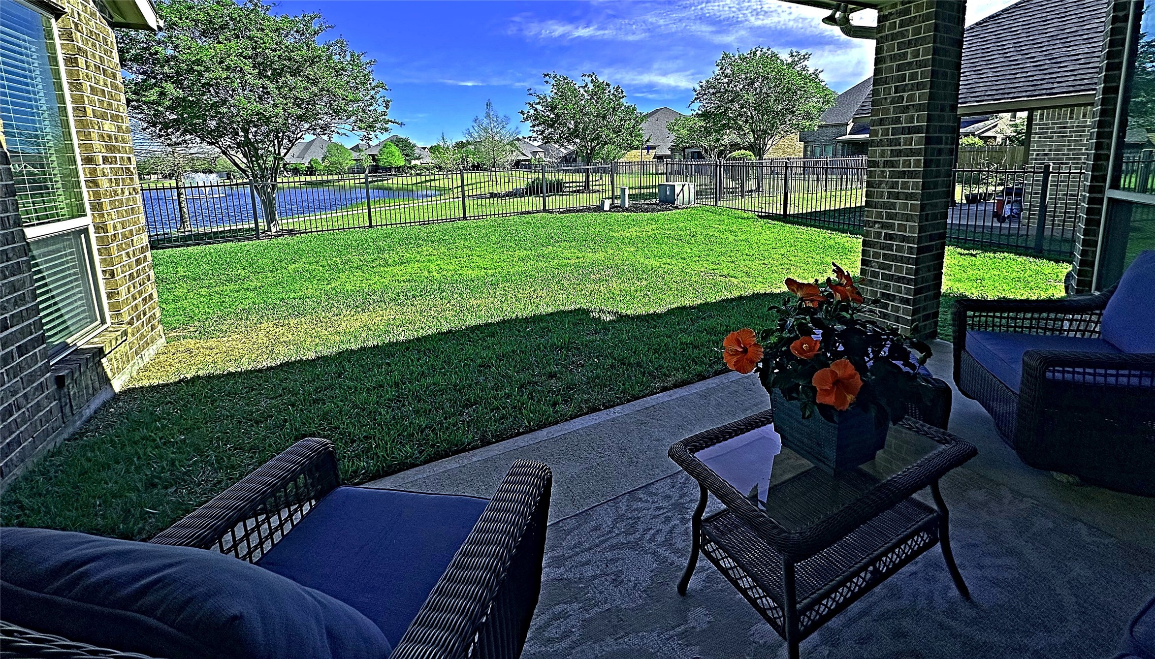27838 Colonial Point Drive Katy, TX 77494 - Photo 5 of 28 Covered patio overlooking the lake-perfect for relaxing or entertaining.