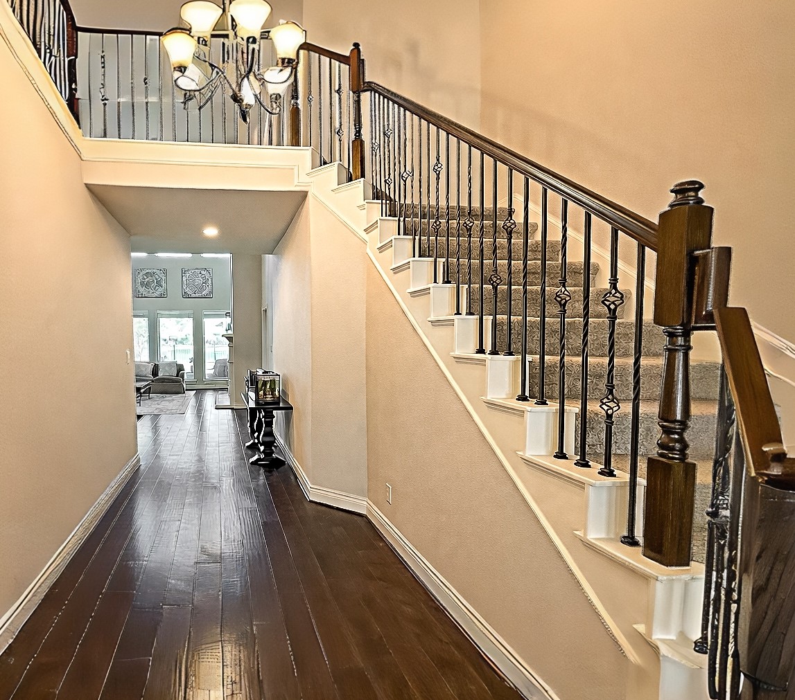 27838 Colonial Point Drive Katy, TX 77494 - Photo 6 of 28 Dramatic entry with sweeping staircase and structural detail.
