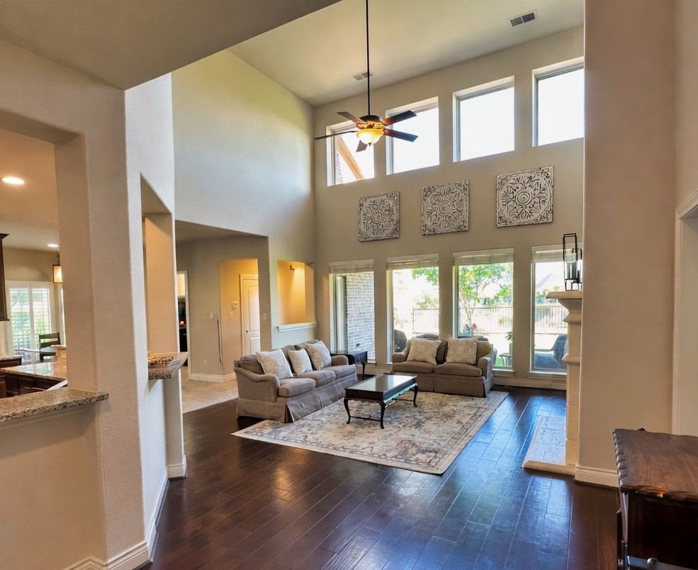 27838 Colonial Point Drive Katy, TX 77494 - Photo 7 of 28 Light filled living room with soaring ceiling and expansive backyard and water views.