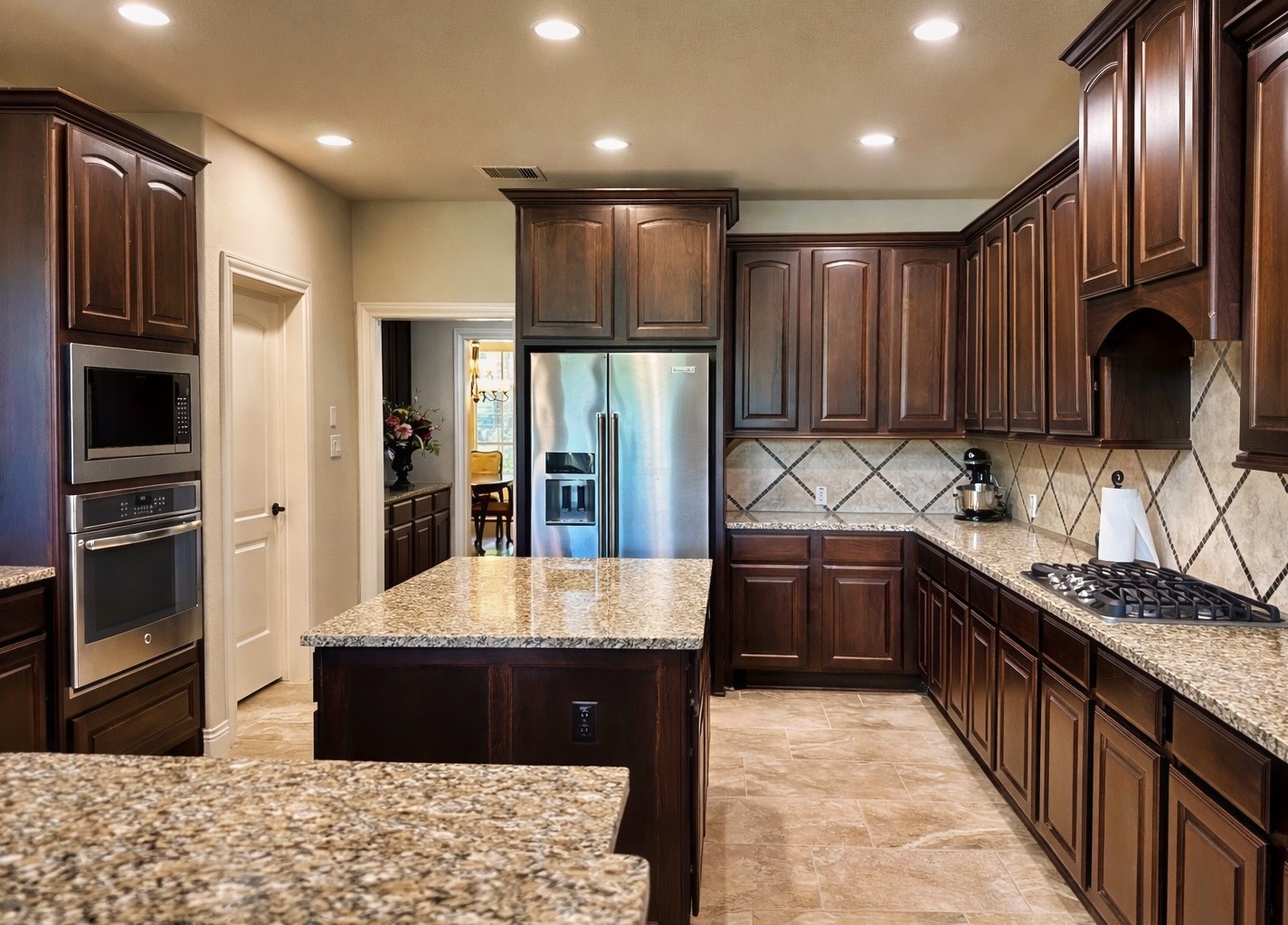27838 Colonial Point Drive Katy, TX 77494 - Photo 9 of 28 Spacious kitchen with abundant cabinetry, large island, and seamless flow into living areas.