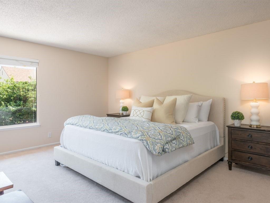 7166 Armstrong Road Goleta, CA 93117 - Photo 17 of 24 a large bed sitting in a bedroom next to a window
