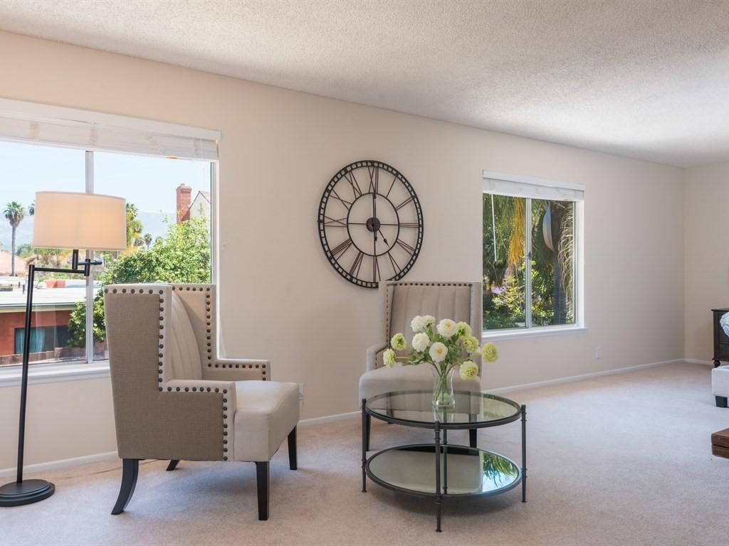 7166 Armstrong Road Goleta, CA 93117 - Photo 18 of 24 a living room with furniture a table and a potted plant