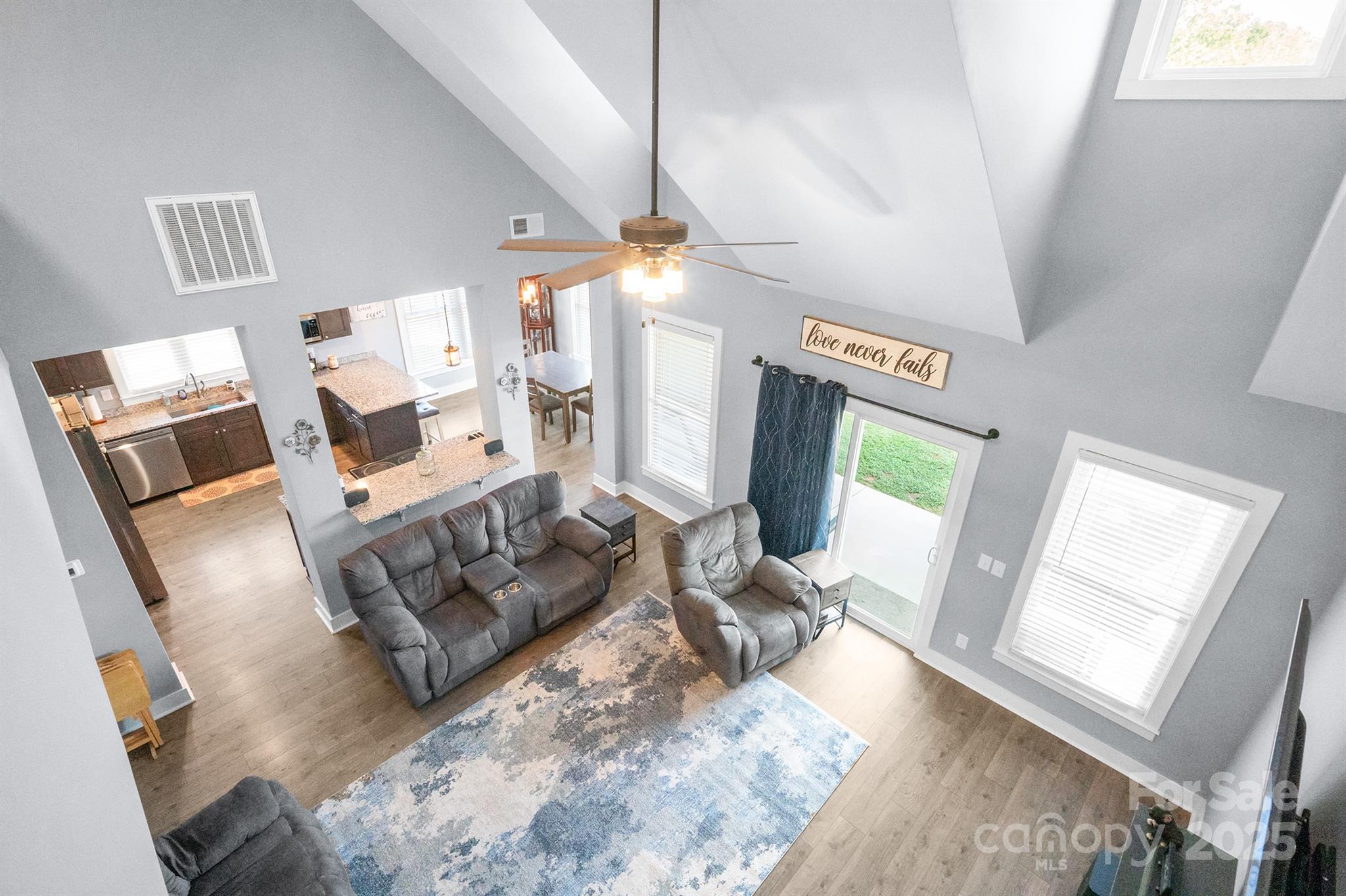 310 Stoneyard Road Richfield, NC 28137 - Photo 27 of 36 a living room with furniture and a flat screen tv