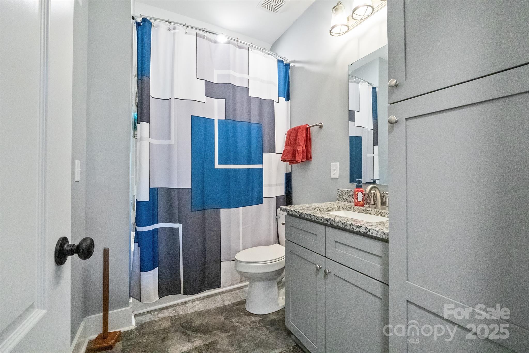 310 Stoneyard Road Richfield, NC 28137 - Photo 28 of 36 a bathroom with a granite countertop sink toilet and shower