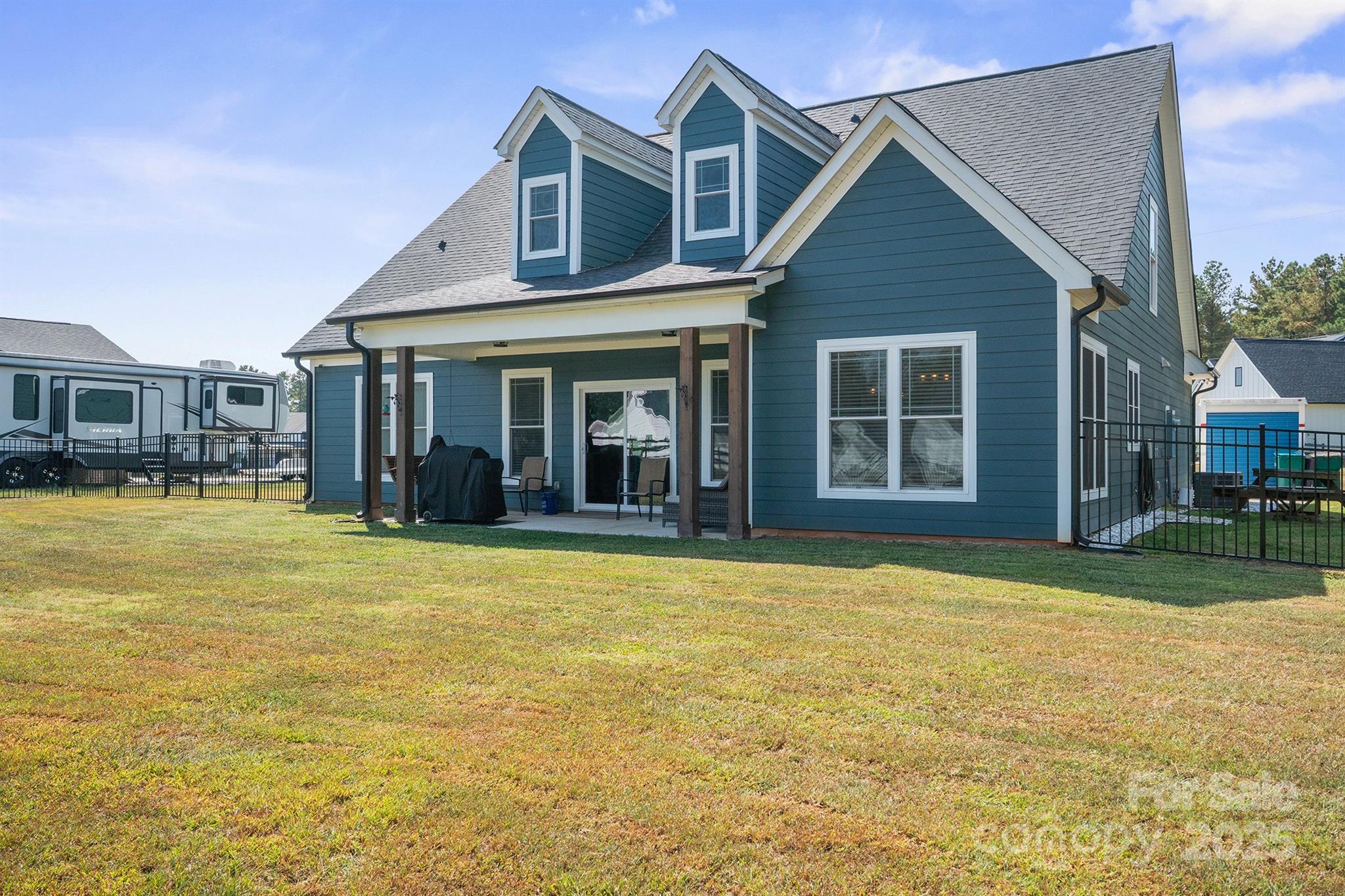 310 Stoneyard Road Richfield, NC 28137 - Photo 31 of 36 a view of a house with a swimming pool