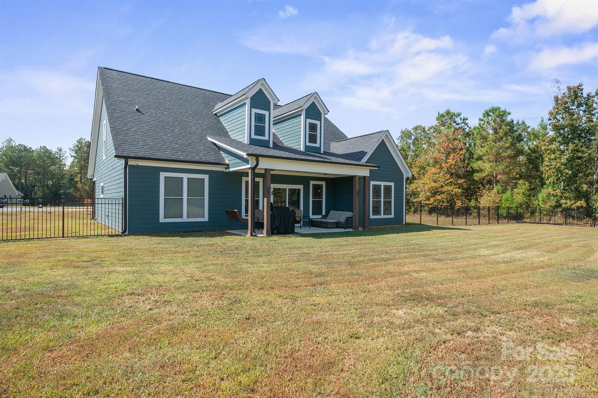 310 Stoneyard Road Richfield, NC 28137 - Photo 33 of 36 a front view of a house with a garden