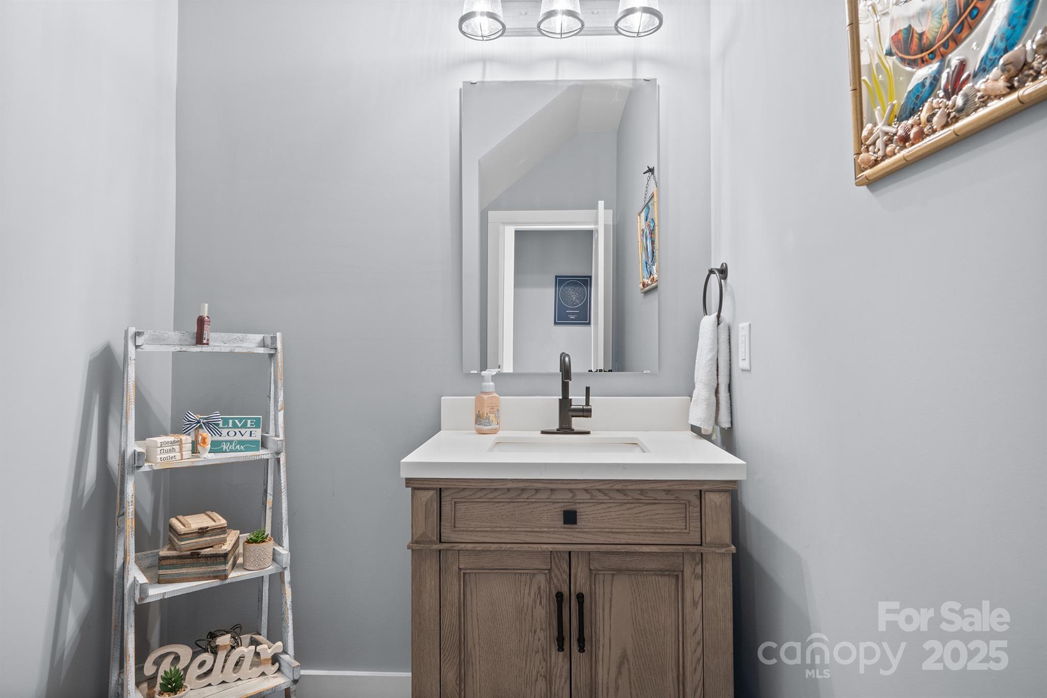 310 Stoneyard Road Richfield, NC 28137 - Photo 5 of 36 a bathroom with a sink and a mirror