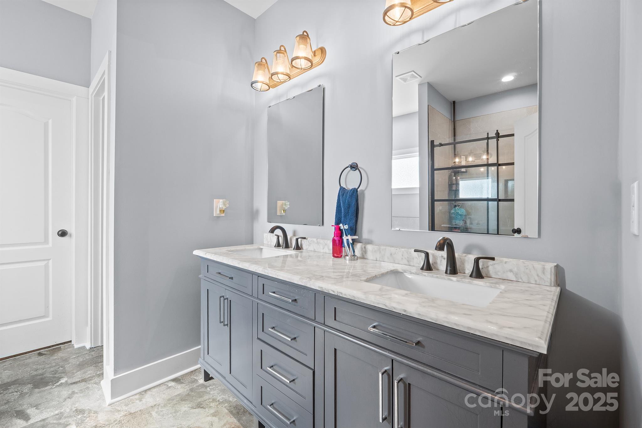 310 Stoneyard Road Richfield, NC 28137 - Photo 8 of 36 a bathroom with a granite countertop sink a large mirror and a window