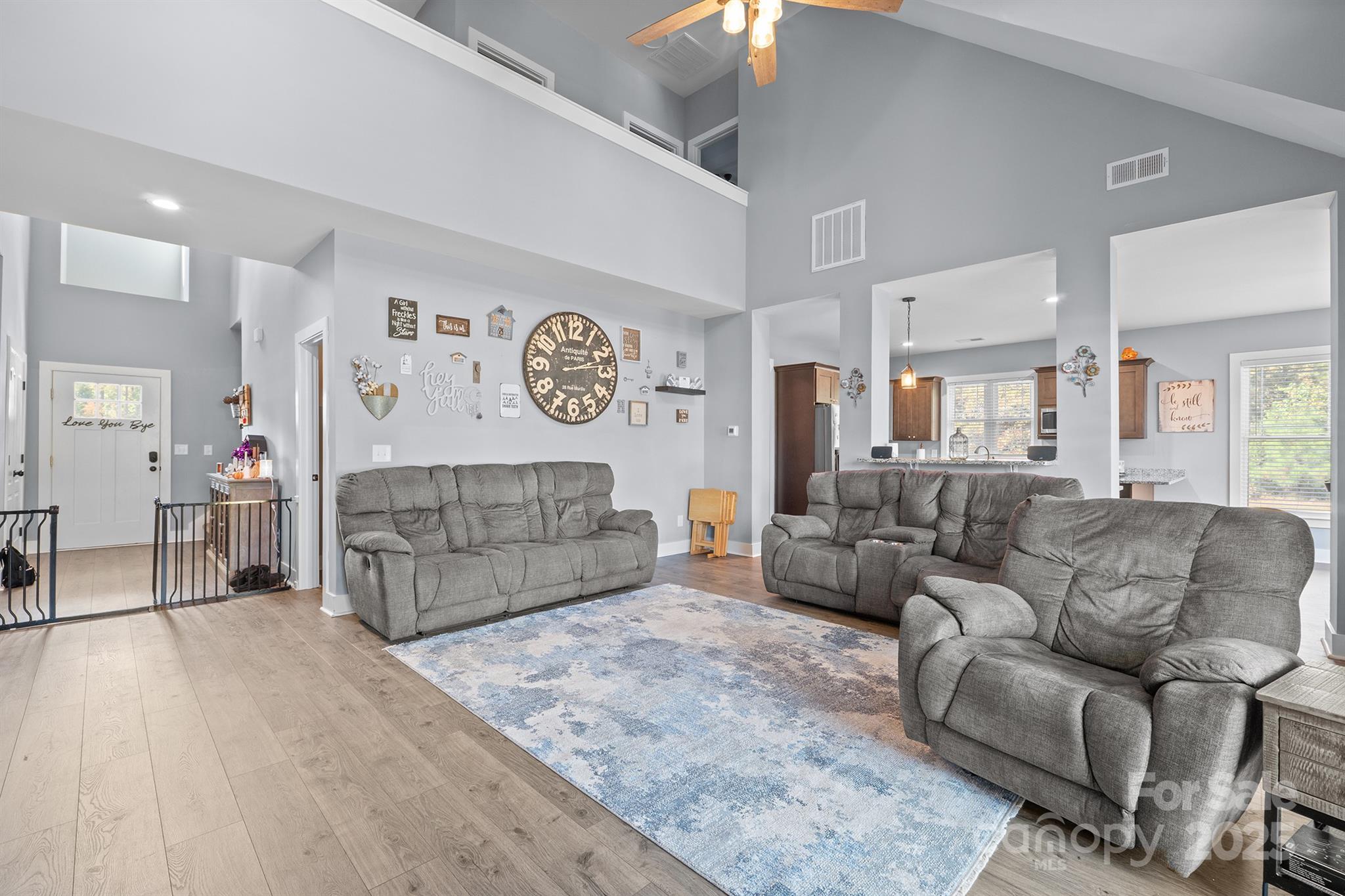 310 Stoneyard Road Richfield, NC 28137 - Photo 9 of 36 a living room with furniture and a flat screen tv
