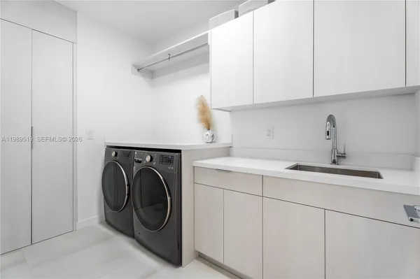 a view of a roof deck with wooden fence and stairs