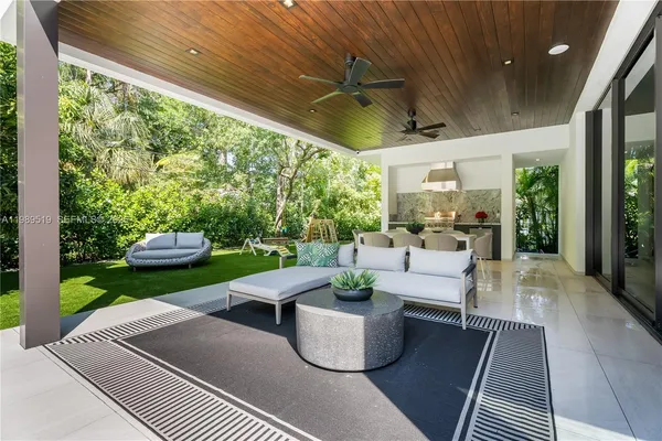 a potted plant sitting in front of a house
