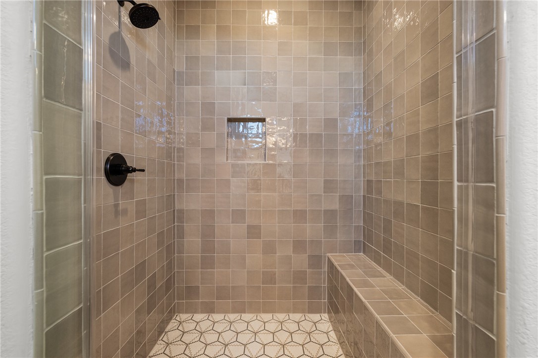 5020 Toscana Loop Bryan, TX 77802 - Photo 23 of 32 a bathroom with a shower