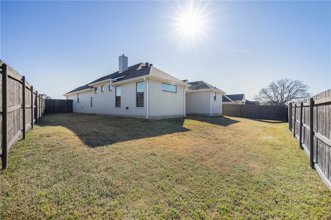 5020 Toscana Loop Bryan, TX 77802 - Photo 28 of 32 a view of a house with wooden fence