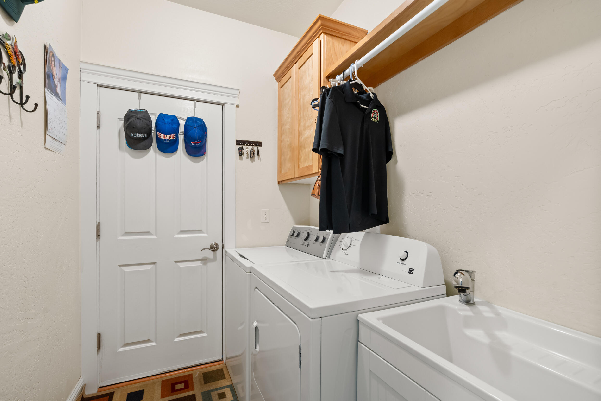 1227 Lithia Way Talent, OR 97540 - Photo 28 of 37 a bathroom with a sink and mirror