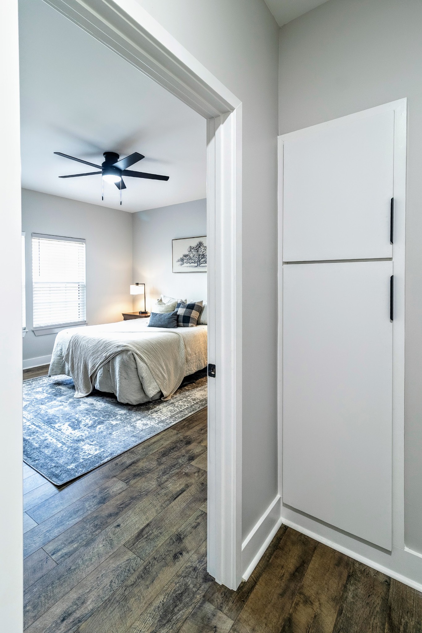 112 Wells Street Centerville, TN 37033 - Photo 11 of 22 a bedroom with a bed and a ceiling fan