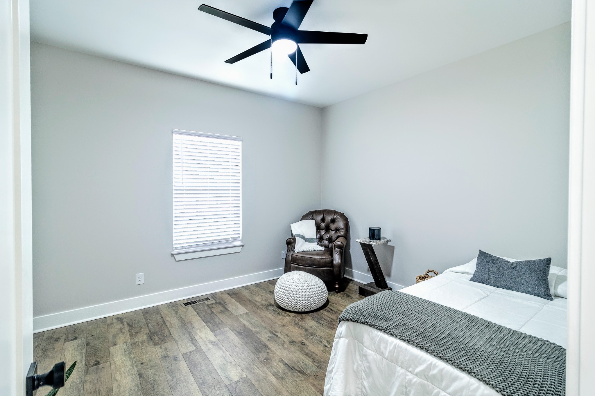 112 Wells Street Centerville, TN 37033 - Photo 13 of 22 a bedroom with a bed and a window