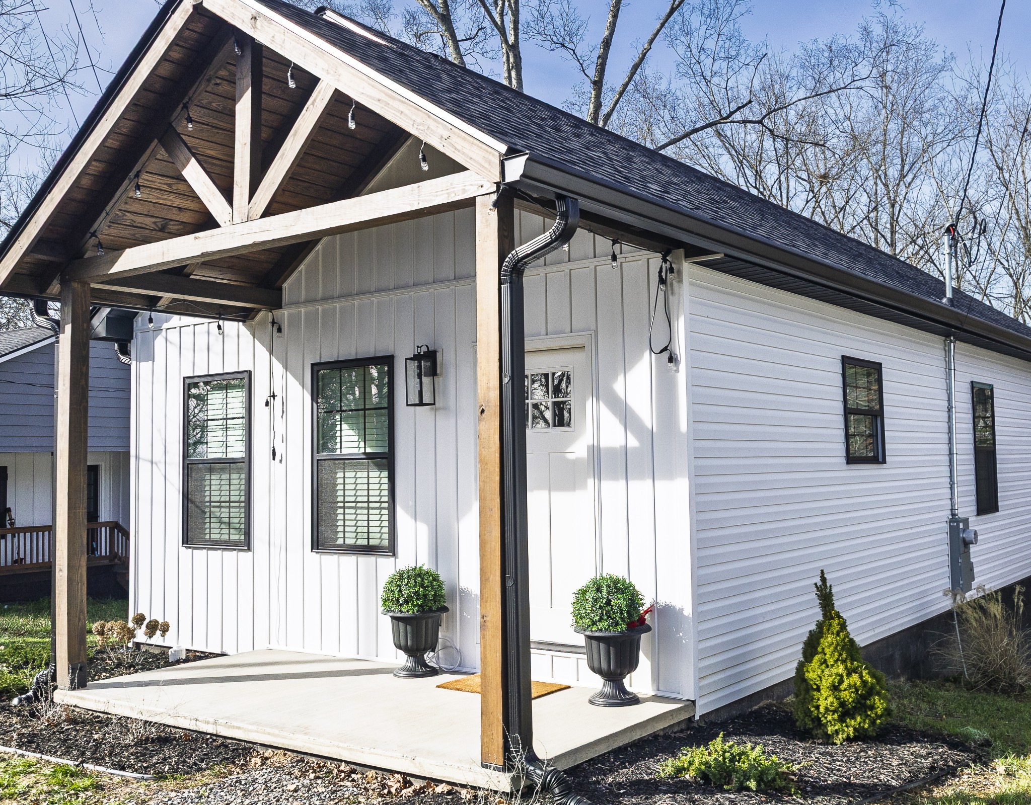 112 Wells Street Centerville, TN 37033 - Photo 17 of 22 a front view of a house with a garden