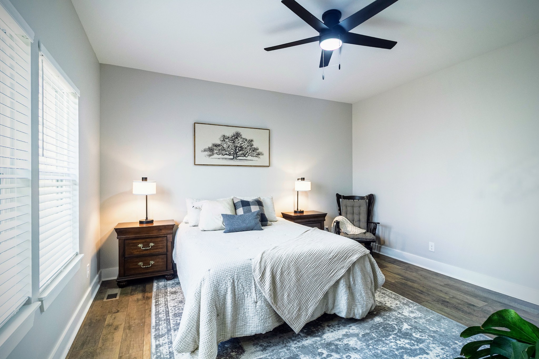 112 Wells Street Centerville, TN 37033 - Photo 10 of 22 a bedroom with a bed and a chandelier