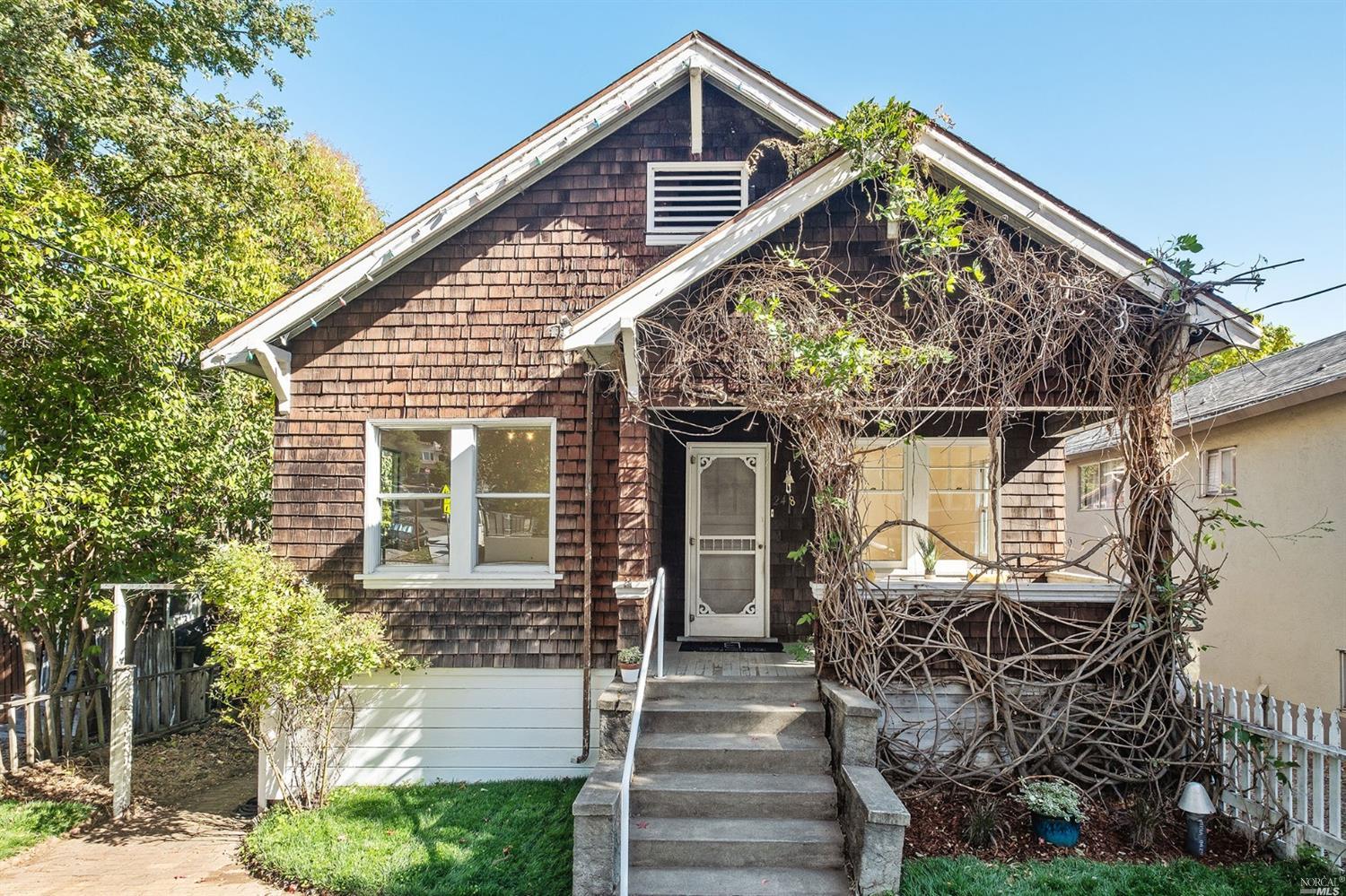 248 Woodland Avenue San Rafael, CA 94901 - Photo 1 of 1 a front view of a house with garden
