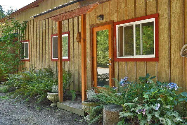 a view of a backyard of the house