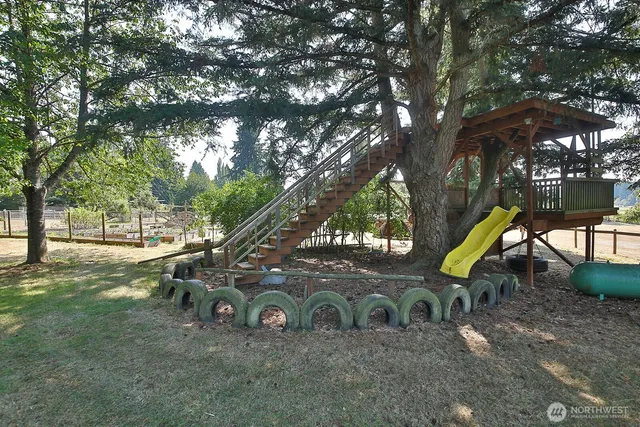 a view of a garage with wooden floor
