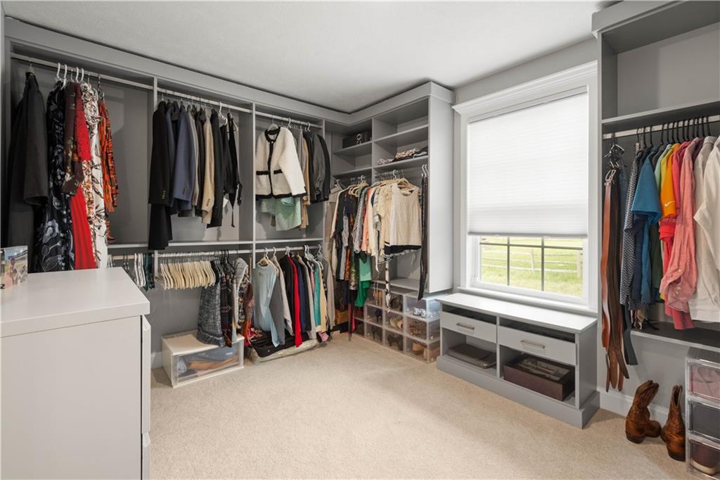 1197 Brook View Court Pittsburgh, PA 15237 - Photo 17 of 30 a view of walk in closet with clothes and shoes